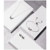 DKNY silver crystal butterfly stud earrings (British brand)