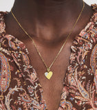 Jade Trau mini yellow gold diamond heart charm, UK version