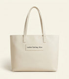 Prada large top-handle leather bag, imported from the UK