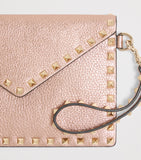 Valentino Garavani Rockstud clutch bag, UK version