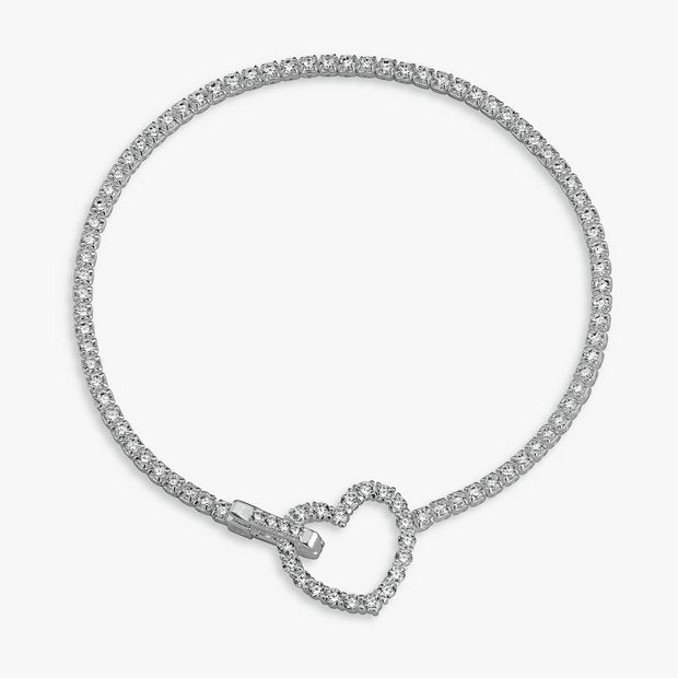Revere silver tennis bracelet with heart-shaped clasp and cubic zirconia, UK version