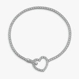 Revere silver tennis bracelet with heart-shaped clasp and cubic zirconia, UK version