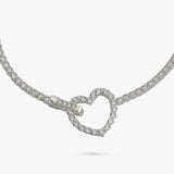 Revere silver tennis bracelet with heart-shaped clasp and cubic zirconia, UK version