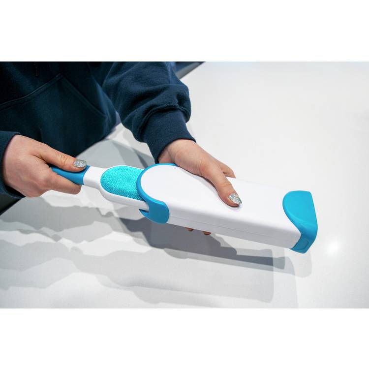 Pet fur remover double-sided brush with self-cleaning base, imported from the UK