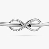 Revere sterling silver infinity diamond studded bangle, imported from the UK