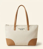 Prada large canvas and leather shopper bag, imported from the UK