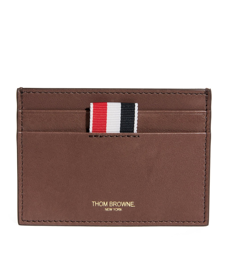 Thom Browne leather card holder with tricolour stripe, imported from the UK