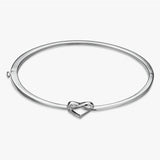 Argos Revere Sterling Silver Diamond Studded Heart Knot Bangle- Buy online at McGrocer