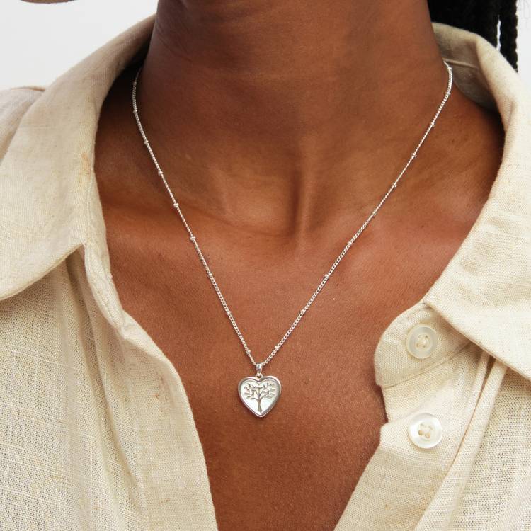 Inicio mother of pearl pendant earrings set, imported from the UK
