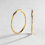 Argos Revere 9ct Gold Twist Creole Hoop Earrings- Buy online at McGrocer