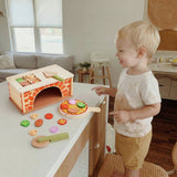 Chad Valley wooden pizza counter toy set with oven and toppings, imported from the UK