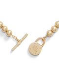 Lauren Ralph Lauren gold bead necklace with engraved pendant, UK version