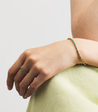 Suzanne Kalan yellow gold and emerald bold linear tennis bracelet, UK version