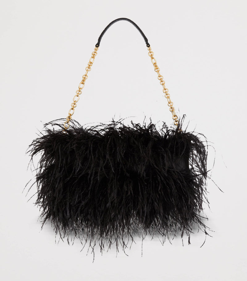 Balmain Anthem clutch bag with long fibres and gold buckle, imported from the UK