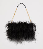 Balmain Anthem clutch bag with long fibres and gold buckle, imported from the UK