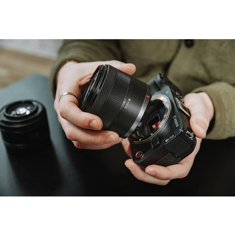 Canon EOS R50 V mirrorless camera with 14-30mm lens (British brand)