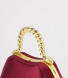 Bvlgari mini satin serpentine top-handle bag, imported from the UK