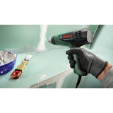Bosch UniversalHeat 600 heat gun with accessories (British brand)