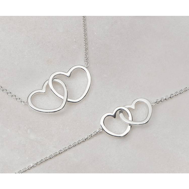 Revere heart cubic zirconia earrings, imported from the UK