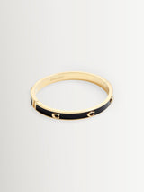 Next COACH Black/Gold Signature Enamel Bangle Bracelet- Buy online at McGrocer