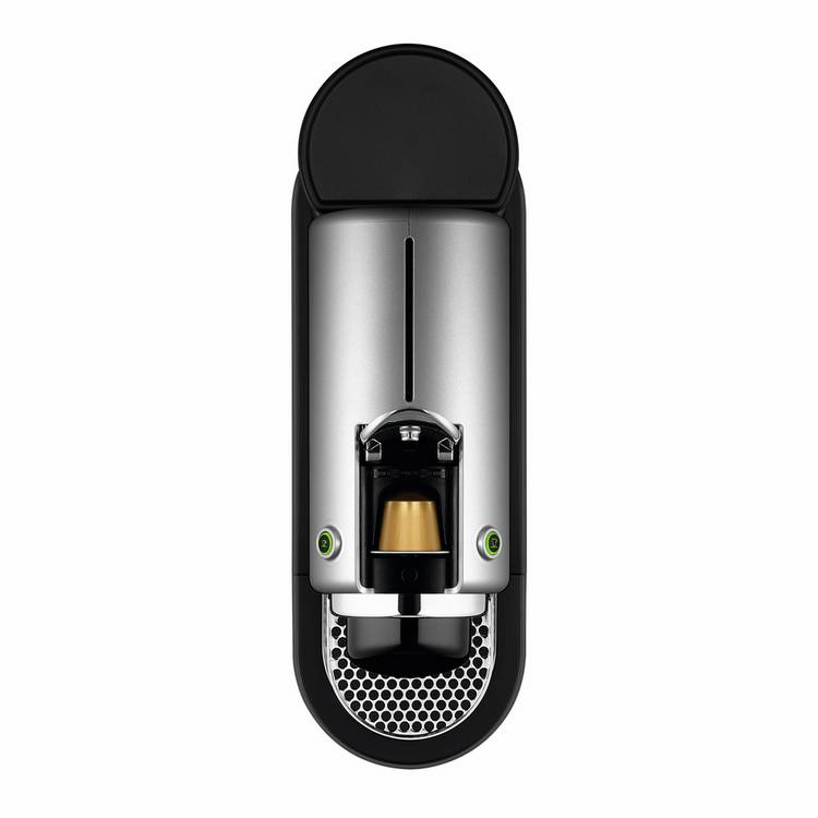 Nespresso coffee pod machine silver, imported from the UK
