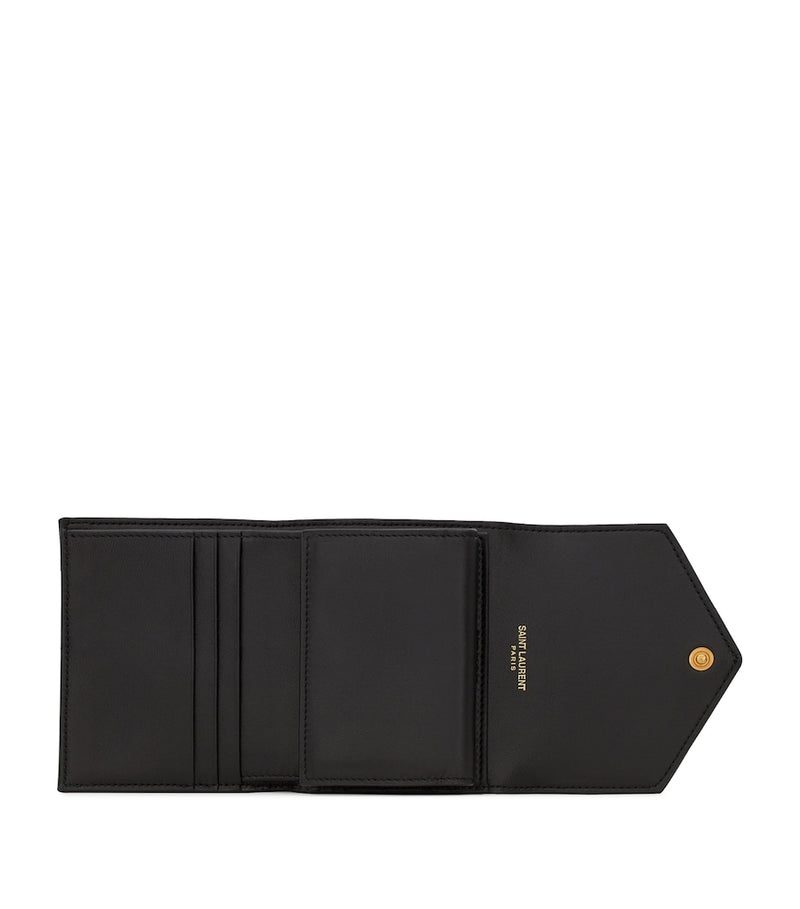 Saint Laurent leather quilted trifold wallet with YSL monogram, imported from the UK