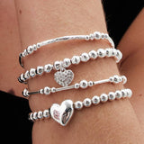 Lipsy silver heart charm stretch bracelet (British brand)
