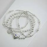 Lipsy silver heart charm stretch bracelet (British brand)