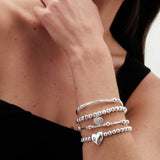 Lipsy silver heart charm stretch bracelet (British brand)