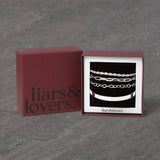 Liars & Lovers silver wristwear set with paperclip chain and bangles (British brand)