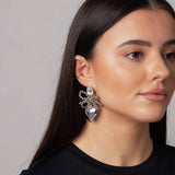 Freedom bow heart drop earrings, imported from the UK