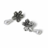 Freedom silver-tone flower pearl drop earrings, imported from the UK