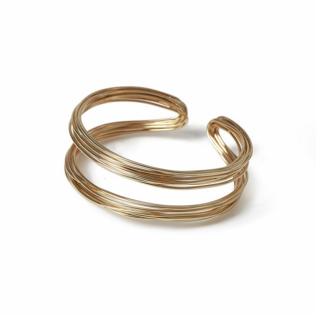 Freedom gold-tone wire cuff bracelet, imported from the UK