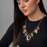 Freedom gold-tone heart charms necklace 52cm - British product