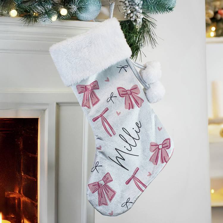 Personalised pink velvet Christmas stocking with white cuff, imported from the UK
