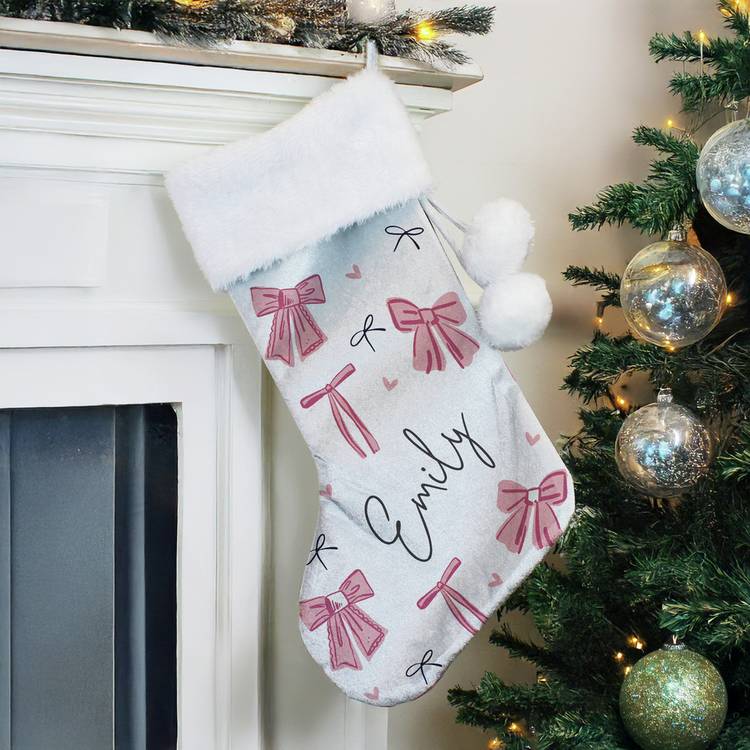 Personalised pink velvet Christmas stocking with white cuff, imported from the UK