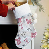 Personalised pink velvet Christmas stocking with white cuff, imported from the UK