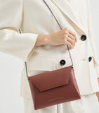 Brunello Cucinelli leather BC Pochette clutch bag, imported from the UK