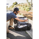 Decathlon travel backpack 56L black clamshell opening (British brand)