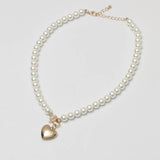 Argos Lipsy Gold Pearl Heart Pendant Necklace 16in- Buy online at McGrocer