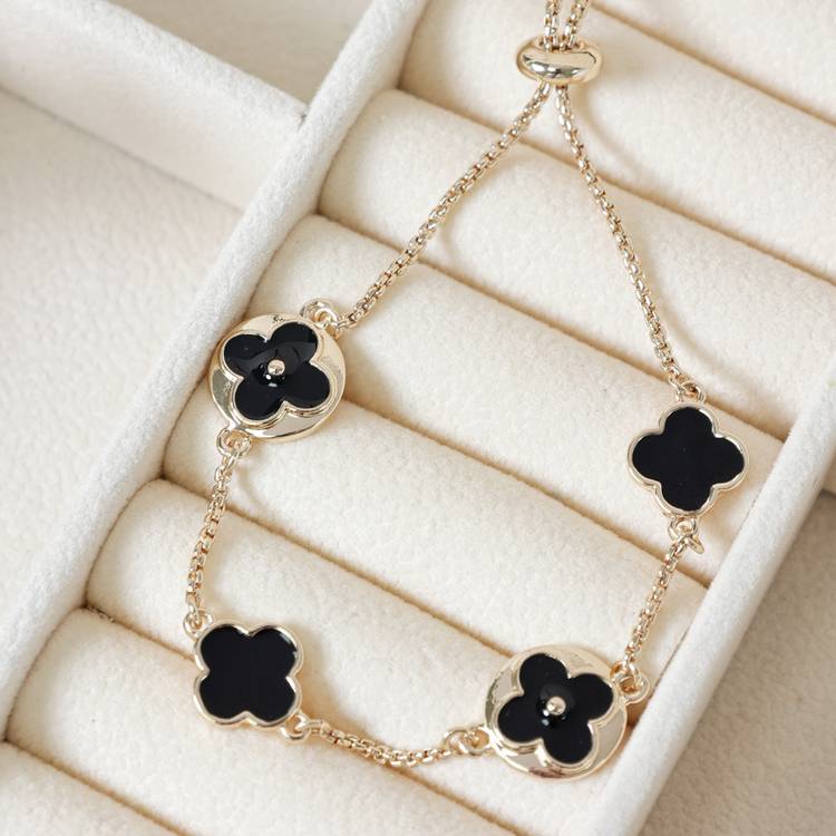 Lipsy gold clover toggle bracelet 21cm, imported from the UK