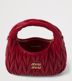Miu Miu matelassé leather Wander top-handle bag (British brand)