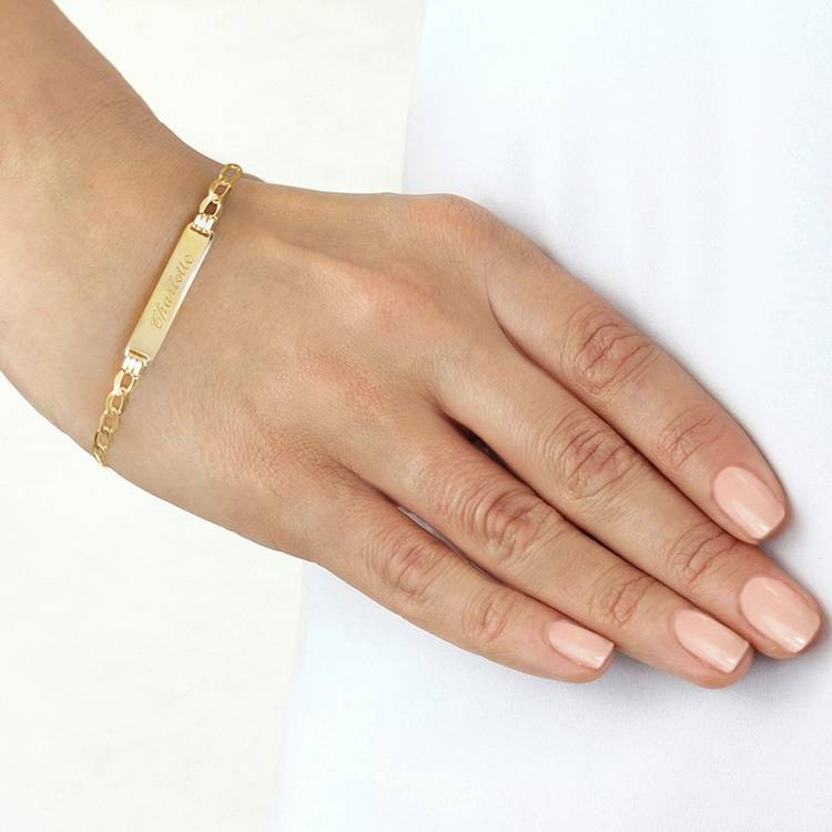 Revere 9ct gold curb ID bracelet (British brand)