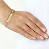 Revere 9ct gold curb ID bracelet (British brand)