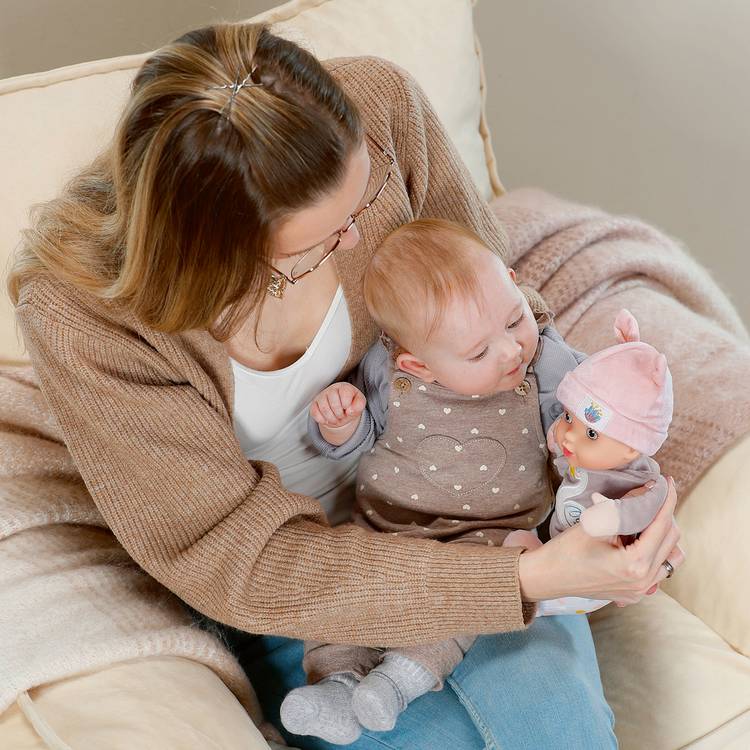 Baby Annabell Sweetie Mauve Doll soft-bodied toy with rattle, UK version
