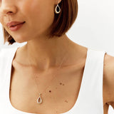 Revere 9ct gold pear pendant necklace with diamonds, UK version