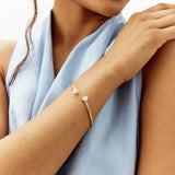 Revere gold plated sterling silver torque bangle with cubic zirconia, imported from the UK