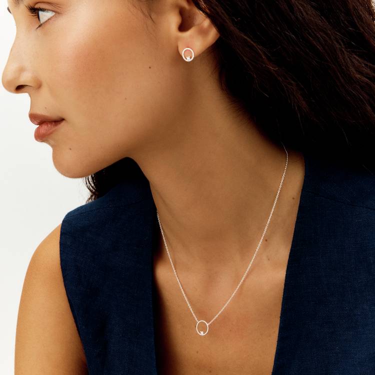 Revere silver circle pendant with cubic zirconia on 18 inch chain, UK version