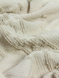 Jeté texturé boho vert eau de mer Furn, version UK