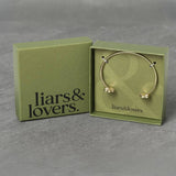 Liars & Lovers gold-plated bangle with crystal flowers (British brand)